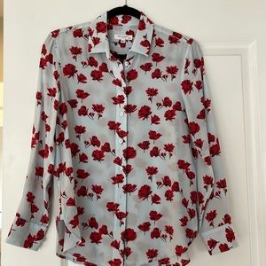 Equipment light blue button down with red flower detail.